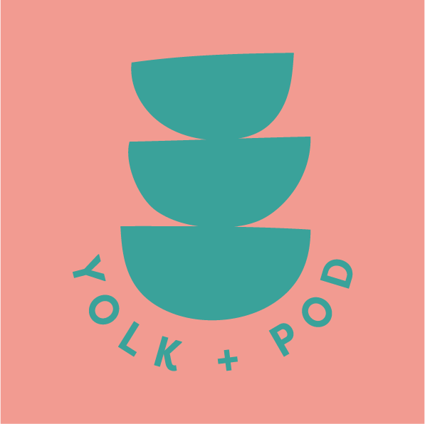 Teal Yolk + Pod logo on pink background
